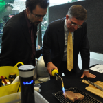 Minister for Science Ian Walker enjoys a sous vide steak with Dr Joel Gilmore